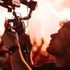 Un român în echipa Tomorrowland: cine este Andrei Mija, tânărul care filmează marile festivaluri ale lumii