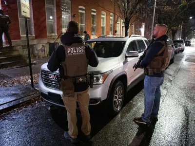 Oficiali americani, amenințați de un român (sursa: Facebook/The United States Department of Justice)