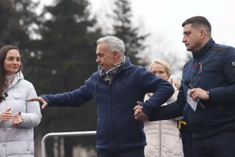 Un site pro-PSD anunță că Bolojan s-ar fi întâlnit cu George Simion și „au bătut palma în culise”