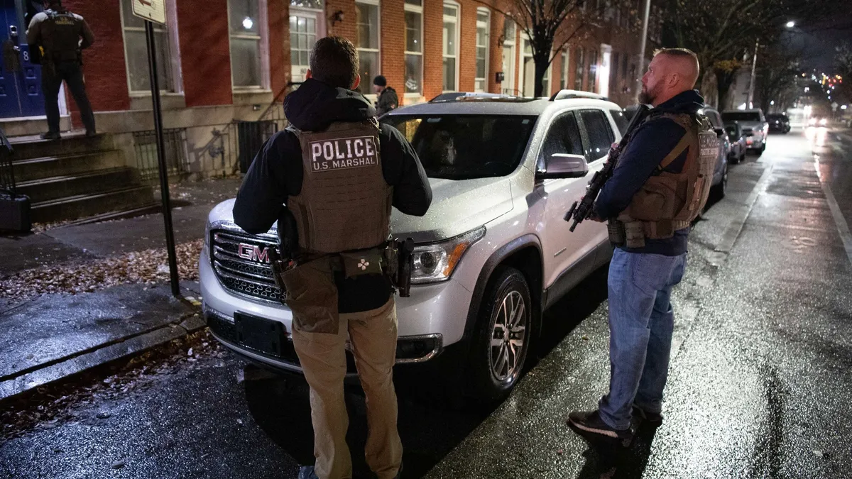 Oficiali americani, amenințați de un român (sursa: Facebook/The United States Department of Justice)