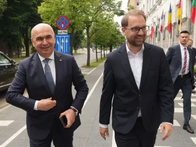Bolojan, mesaj de împăcare către USR, după ce PNL a votat legea cu amendamentul anti-Fritz