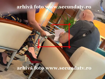 Potra, fotografiat când lua cărămizi de bani de la o rusoaică Foto: Secunda TV