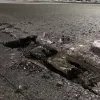 CNAIR, amendată pentru gropile de pe autostradă, care avariază mașinile. Amenda, ridicol de mică