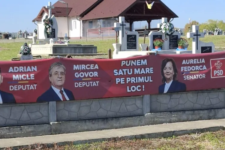 PSD, campanie electorală pe gardul cimitirului (sursa: reportersm.ro)