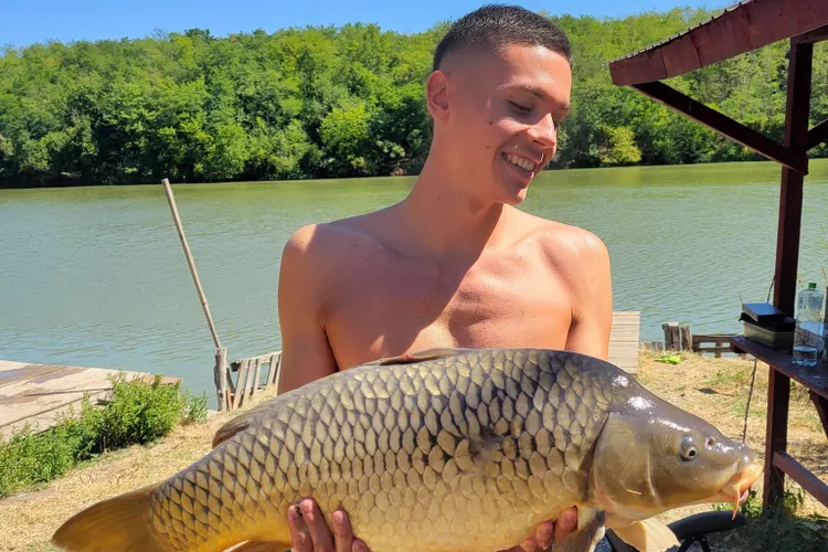 Postare virală a lui David Popovici, la pescuit Foto: Facebook