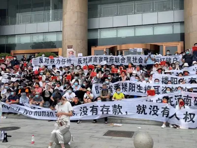 Protest anti-corupție în Henan, China (sursa: japantimes.co.jp)